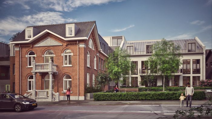 Impressie van nieuwbouwproject ’t Oude Raadhuis Ulestraten met gerenoveerde gevel en moderne woningen.
