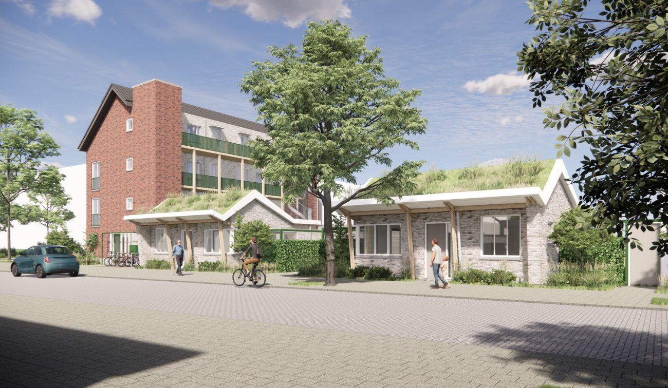 Impressie van het nieuwbouwproject Voetnoodt, met zicht op het appartementencomplex en de bungalows vanuit een andere hoek, omgeven door groen.