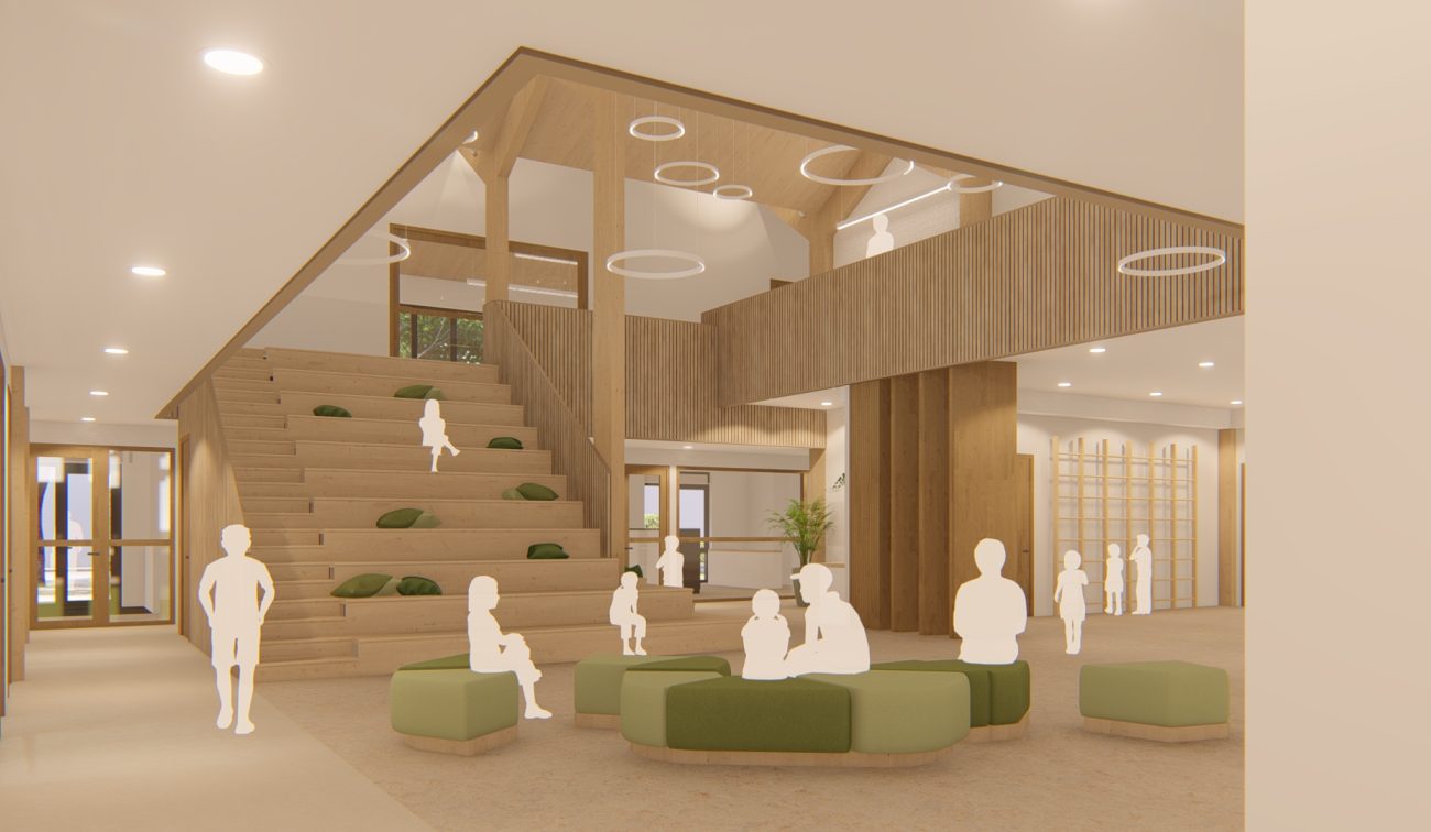 Binnenruimte nieuwbouw SKC Berg en Terblijt met houten lamellen, brede traptribune en zitblokken