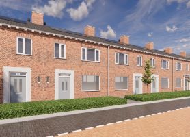 Impressie van een straat nabij het Bernadusplein in Tilburg, met vernieuwde woningen en groen na de uitvoering van het groot onderhoud.