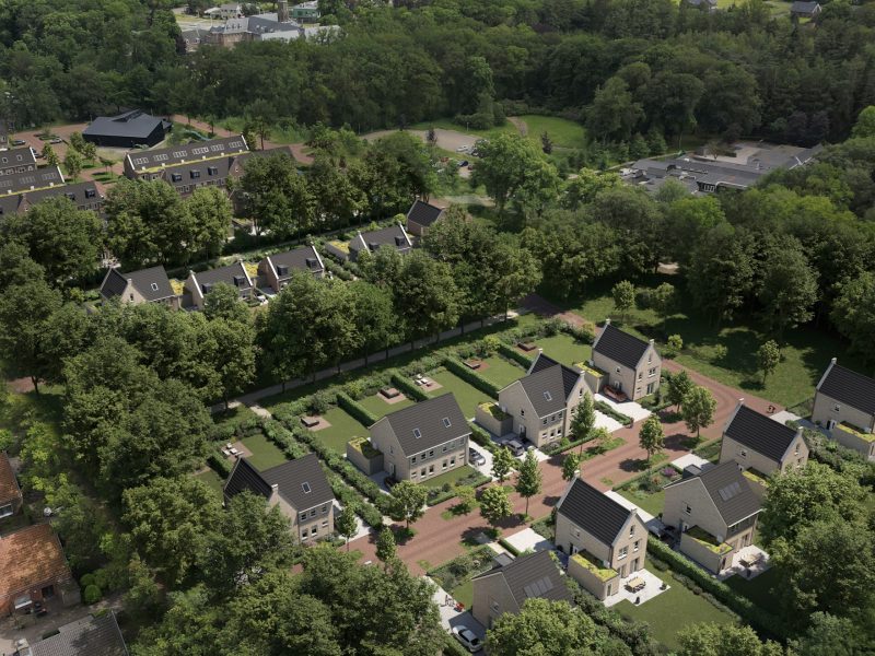 Luchtimpressie van Bosrijk Mariendaal in Velp – nieuwe woonwijk met vrijstaande woningen tussen veel groen, bomen en slingerende paden.