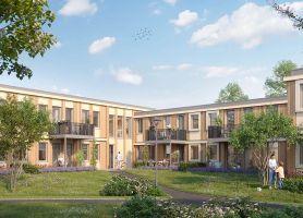Woningbouw rond groene binnentuin met balkons, wandelpaden en bomen