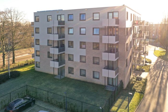 Nieuwbouw Noorderkroon Brunssum – modern vijflaags appartementengebouw met balkons, metselwerk en licht gestucte gevel